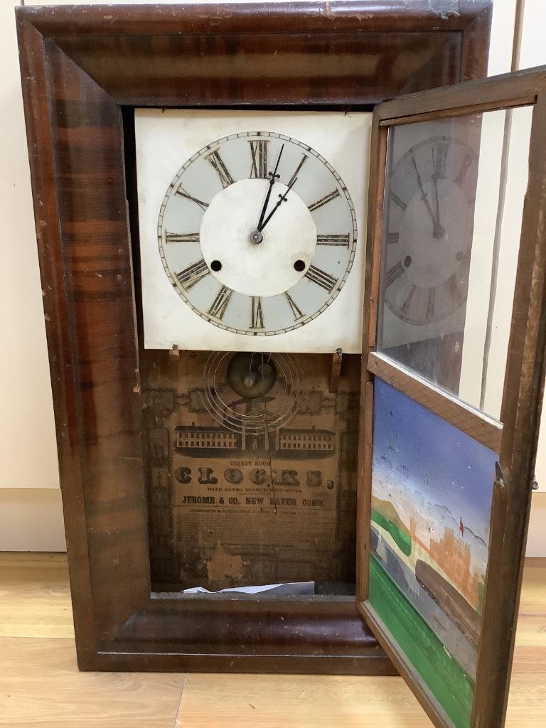 An American wall clock, by Jerome & Co, height 66cm